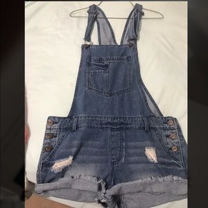 Denim overall shorts.